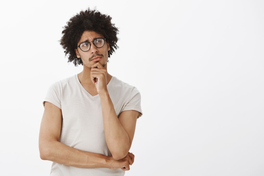 image of a man thinking on how to Prepare himsself for his First Therapy Session. Tips for a Grounded Start